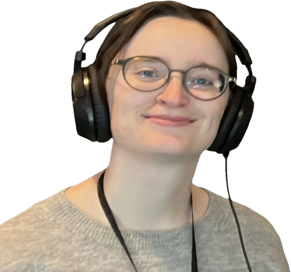 Jo wearing headphones, looking content